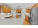 Modern kitchen featuring granite countertops, stainless steel appliances, and wooden cabinetry at 2045 10Th Street Nw Ln, Hickory, NC 28601