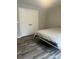 Simple bedroom with a standard double door closet, gray walls, and a twin bed at 208 Stone Ridge Dr, Salisbury, NC 28146
