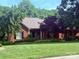 Charming brick home with manicured lawn and mature trees at 208 Stone Ridge Dr, Salisbury, NC 28146