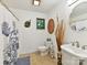 Cozy bathroom featuring classic fixtures, a shower with curtain, and a decorative mirror at 218 Point Carpenter Rd, Fort Mill, SC 29707