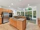 Well-appointed kitchen with an island cooktop and stainless steel appliances, ideal for Gathering meals at 218 Point Carpenter Rd, Fort Mill, SC 29707