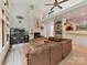 Spacious living room with high ceilings, fireplace, and ample natural light, open to the modern kitchen at 218 Point Carpenter Rd, Fort Mill, SC 29707