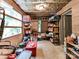 Unfinished storage room with shelving, a brick wall, and boxes at 218 Point Carpenter Rd, Fort Mill, SC 29707