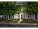 Charming townhome featuring well-manicured landscaping, a welcoming entrance, and inviting curb appeal at 2444 Mariners Cove Ln, Denver, NC 28037