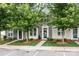 Charming townhome exterior with manicured lawn, sidewalk and inviting front door at 2444 Mariners Cove Ln, Denver, NC 28037