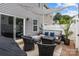 Relaxing patio area with comfortable seating, a sun shade, and a well-maintained outdoor space at 2444 Mariners Cove Ln, Denver, NC 28037