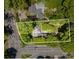 Aerial view of two lots, surrounded by mature trees and adjacent to a street, showcasing land and location at 2861 Sharon Rd # 1, Charlotte, NC 28211