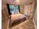 Comfortable bedroom with stylish decor and a window offering natural light and a pleasant view at 295 Rendleman Rd, Salisbury, NC 28146