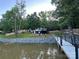 Charming waterfront property with a cozy home, a private dock and spacious outdoor entertaining areas at 295 Rendleman Rd, Salisbury, NC 28146