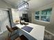 Modern kitchen with stainless steel appliances, stylish lighting, and a sleek breakfast bar at 295 Rendleman Rd, Salisbury, NC 28146