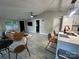 Open living space featuring a living room area, kitchen and breakfast bar with lots of natural light at 295 Rendleman Rd, Salisbury, NC 28146
