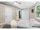 Relaxing bedroom featuring neutral tones, natural light, and convenient access to an en-suite bathroom at 295 Rendleman Rd, Salisbury, NC 28146