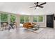 Bright living room with vaulted ceiling, hardwood floors, and an abundance of natural light at 295 Rendleman Rd, Salisbury, NC 28146