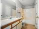 Bathroom with a tub/shower, single sink vanity and neutral-colored walls at 317 Cedarcroft Dr, Mooresville, NC 28115