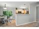 Cozy eat-in kitchen and dining area, with access to outdoor patio space at 317 Cedarcroft Dr, Mooresville, NC 28115
