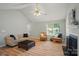 Spacious living room featuring a fireplace, seating and a ceiling fan at 317 Cedarcroft Dr, Mooresville, NC 28115