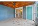Screened-in patio with wooden ceiling and blue walls offers outdoor access at 317 Cedarcroft Dr, Mooresville, NC 28115