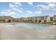 A large community pool with a bathhouse, surrounded by the community homes at 3436 Scottish Fern Ln # 172, Indian Land, SC 29707