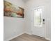 Bright foyer featuring a glass-paneled front door and modern decor at 3436 Scottish Fern Ln # 172, Indian Land, SC 29707