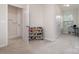 Hallway featuring neutral walls, carpet flooring, and ample natural light, perfect for a welcoming transition space at 3436 Scottish Fern Ln # 172, Indian Land, SC 29707