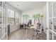 Bright office space with a large window and tree-themed wall decor at 3436 Scottish Fern Ln # 172, Indian Land, SC 29707