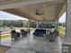 Community pool cabana offers comfortable outdoor seating with ceiling fans for relaxation and shade at 3436 Scottish Fern Ln # 172, Indian Land, SC 29707
