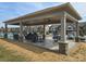Community pool cabana with ceiling fans, outdoor seating and tables for residents to enjoy at 3436 Scottish Fern Ln # 172, Indian Land, SC 29707