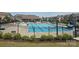 Community pool with black fence, lounge chairs and clear blue water ready for a swim and relaxation at 3436 Scottish Fern Ln # 172, Indian Land, SC 29707