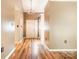 Welcoming entryway with hardwood floors and a view of the front door at 3505 Frostmoor Pl, Charlotte, NC 28269