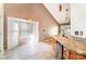 Kitchen nook featuring tile floors, granite countertops and modern fixtures at 3505 Frostmoor Pl, Charlotte, NC 28269