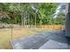 Expansive concrete patio in a verdant backyard, ideal for entertaining and relaxation at 3505 Frostmoor Pl, Charlotte, NC 28269
