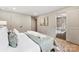 Bright bedroom with view into bathroom and hardwood floors at 3661 Annlin Ave, Charlotte, NC 28209