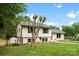 Two-story home with fresh landscaping, featuring a well-manicured lawn at 3661 Annlin Ave, Charlotte, NC 28209