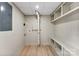 Spacious laundry room with shelving, cabinetry and hookups at 3661 Annlin Ave, Charlotte, NC 28209