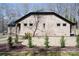 Wide angle view of back of the house with green grass, trees and shrubs at 4531 Dry Run Rd, Fort Mill, SC 29708