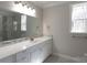 Bathroom features white vanity, stone tiled shower, and natural light from window at 4531 Dry Run Rd, Fort Mill, SC 29708