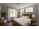 Bedroom features windows allowing for natural light and wooden floors at 4531 Dry Run Rd, Fort Mill, SC 29708