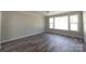 Bright, empty bedroom with large windows providing natural light at 4531 Dry Run Rd, Fort Mill, SC 29708