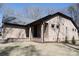 Low angle side view of charming single-story brick home and landscaped yard at 4531 Dry Run Rd, Fort Mill, SC 29708