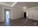 Spacious foyer featuring hardwood floors and a large closet for storage at 4531 Dry Run Rd, Fort Mill, SC 29708