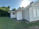 Back exterior of a home with white siding and a well-maintained yard at 462 Dave Lyle Blvd, Rock Hill, SC 29730