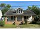 Charming single-Gathering home featuring a covered porch and neat front yard at 462 Dave Lyle Blvd, Rock Hill, SC 29730