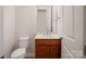 Cozy half bathroom featuring a vanity with a wood cabinet at 467 Granite Lake Ct, Denver, NC 28037