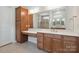 Spacious bathroom with wood cabinets and vanity with white countertop at 467 Granite Lake Ct, Denver, NC 28037