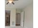 Bright bedroom featuring neutral walls, carpet floors, and ceiling fan at 467 Granite Lake Ct, Denver, NC 28037