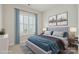Cozy bedroom featuring a plush bed with blue accents and artwork enhancing the room's appeal at 467 Granite Lake Ct, Denver, NC 28037