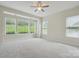 Spacious bedroom featuring a bay window and cozy carpet at 467 Granite Lake Ct, Denver, NC 28037