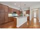 Spacious kitchen with a large island, modern appliances, and beautiful wood cabinets at 467 Granite Lake Ct, Denver, NC 28037