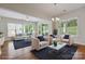 Open concept floor plan showcases a spacious living room filled with abundant natural light at 467 Granite Lake Ct, Denver, NC 28037