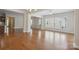This open-concept living room features hardwood floors and lots of natural light at 467 Granite Lake Ct, Denver, NC 28037
